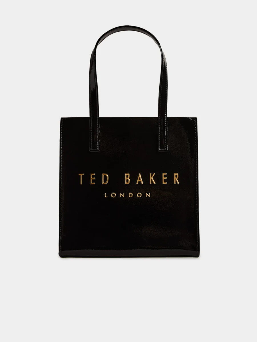 Black Ted Baker handbag with gold lettering